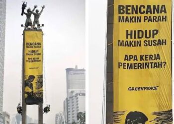 Viral! Aksi Greenpeace di Patung Bundaran HI, Pesan Krisis Iklim dan Beban Hidup Menggema